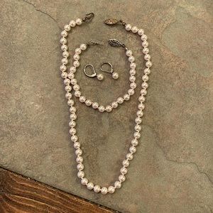 Soft pink necklace, bracelet and earring set.